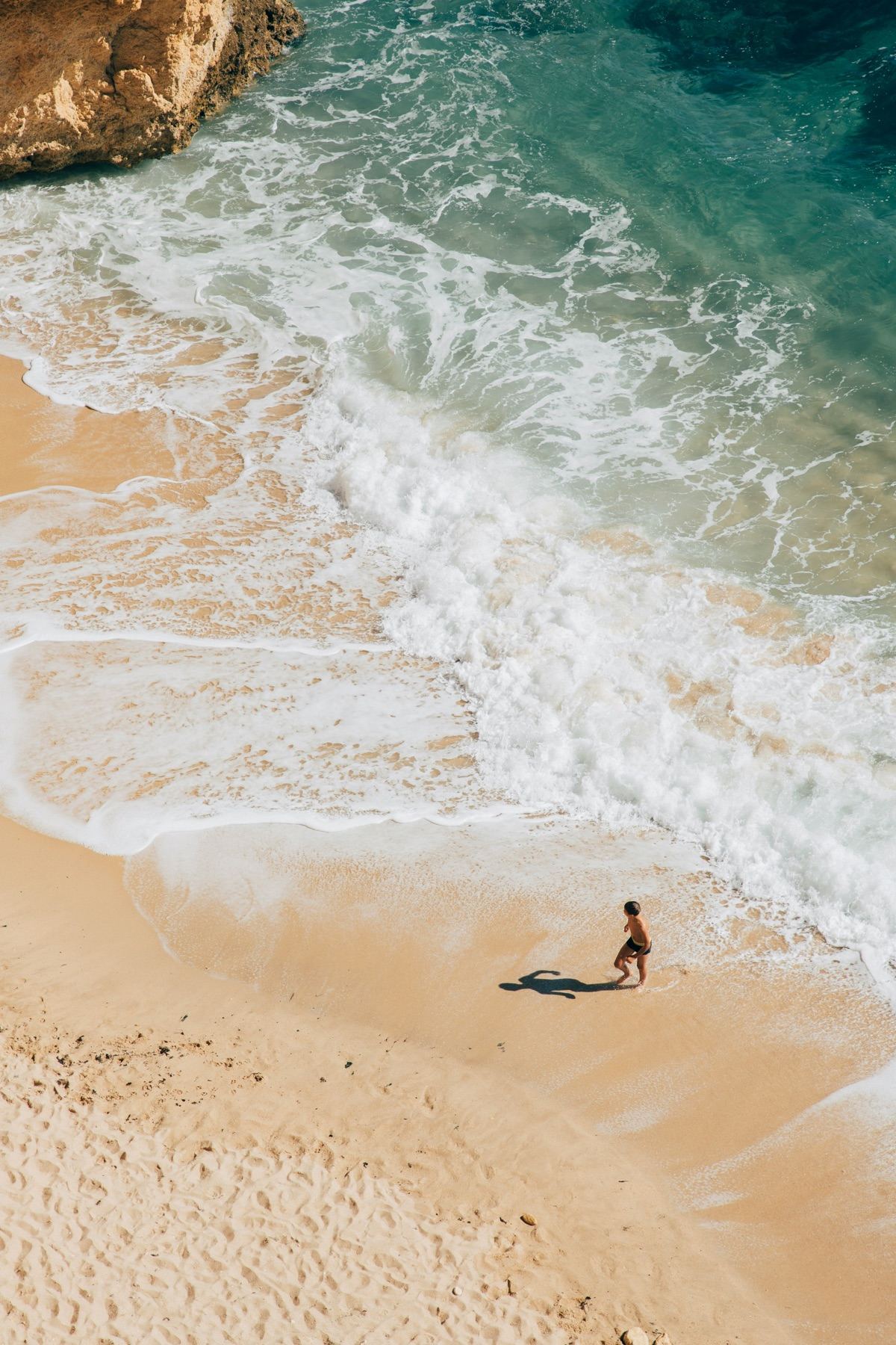 Aerial view of an Algarve beach and cliffs